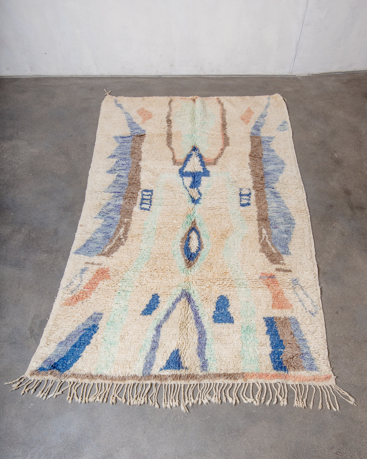 Modern, designer, handcrafted Berber rug from Morocco. Vintage carpet with beautiful colours and patterns and fluffy texture.